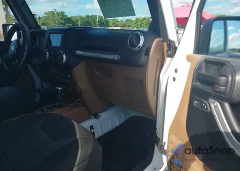 2013 Jeep Wrangler Unlimited Sahara z USA, uszkodzony, nr VIN 1C4BJWEG0DL599839